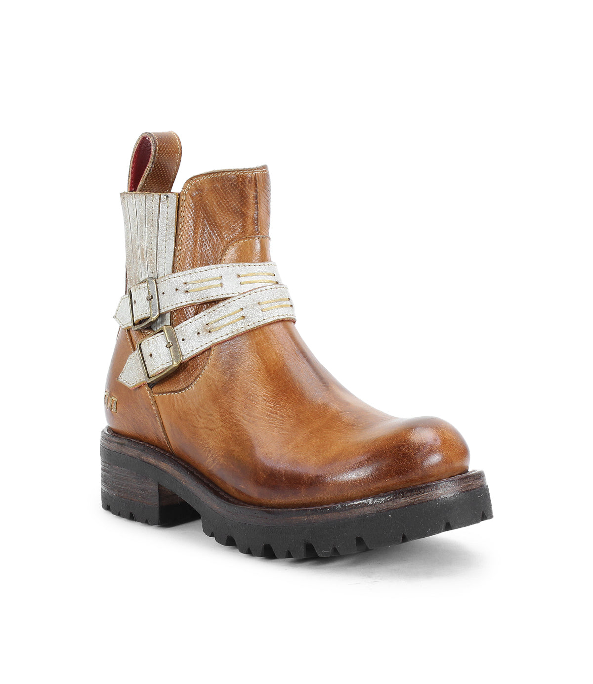 The Bed Stu Daring boots are brown leather ankle boots with a thick black sole and white adjustable buckle straps, offering a rugged style.