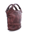 A Delilah by Bed Stu brown leather handbag with a handle.
