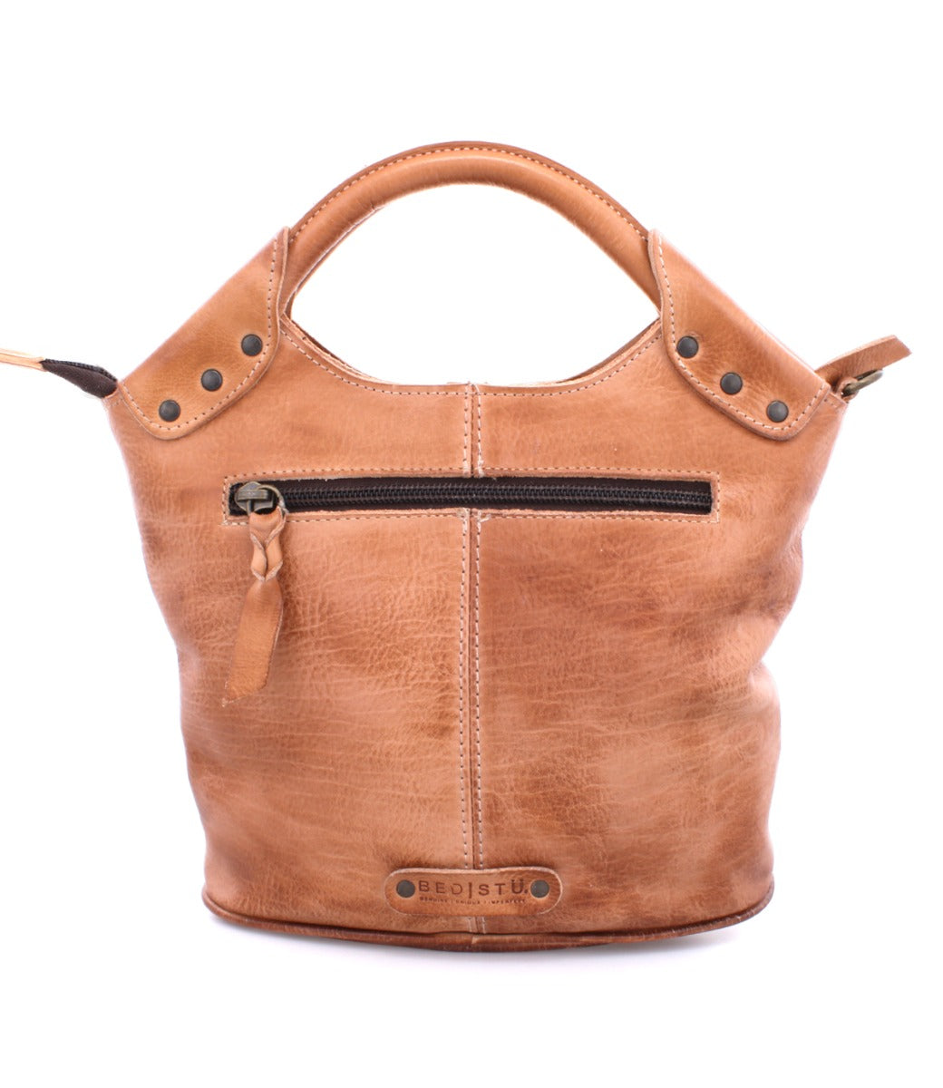 A Delilah leather handbag from Bed Stu with a zipper.