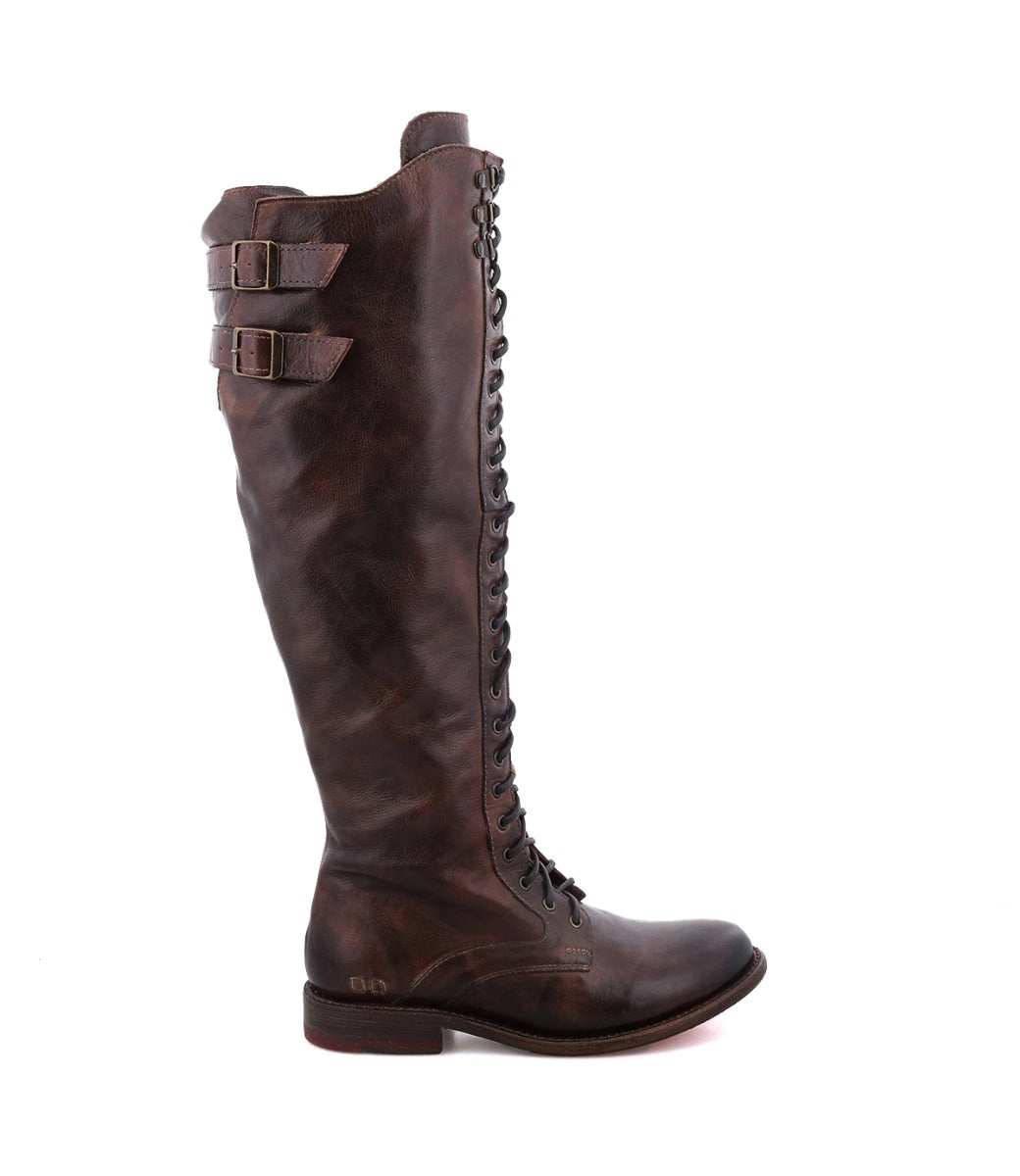 A women's brown boot with buckles and laces, the Della from Bed Stu.