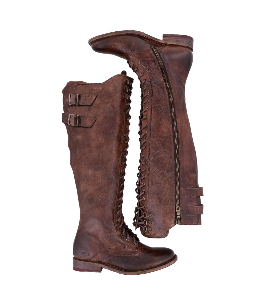 A pair of Della brown boots from Bed Stu with buckles and zippers.