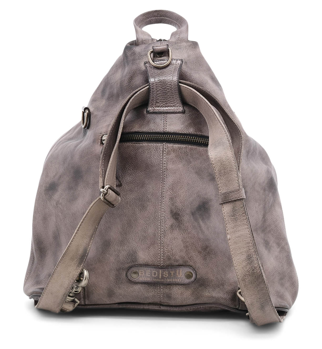A grey leather Bed Stu backpack with straps and buckles.