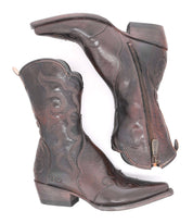 A pair of Deuce cowboy boots in western style on a white background by Bed Stu.