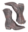 A pair of Deuce cowboy boots in western style on a white background by Bed Stu.