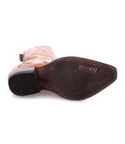 A pair of Bed Stu Deuce western-style cowboy leather boots on a white background.