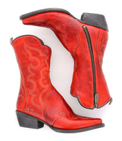 A pair of Bed Stu Deuce cowboy boots on a white background.