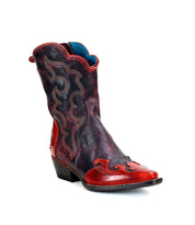 The Deuce women's mid-calf cowboy boot by Bed Stu features a striking red and black color scheme with decorative stitching, a pointed toe, and a low heel. This stylish boot is expertly crafted from vegetable-tanned leather.