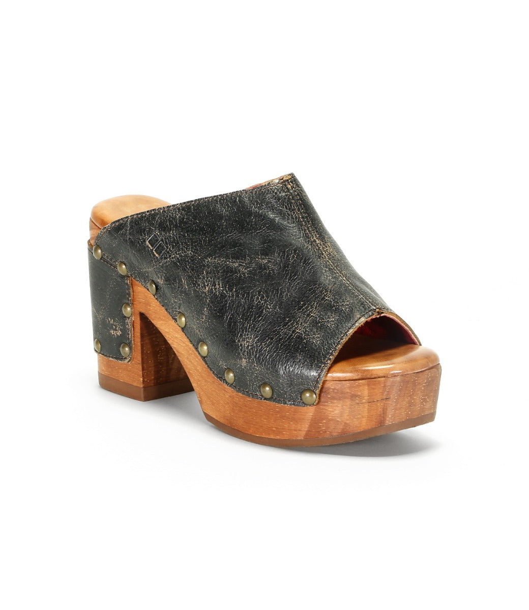 A women's Deva black leather mule with wooden platform by Bed Stu.