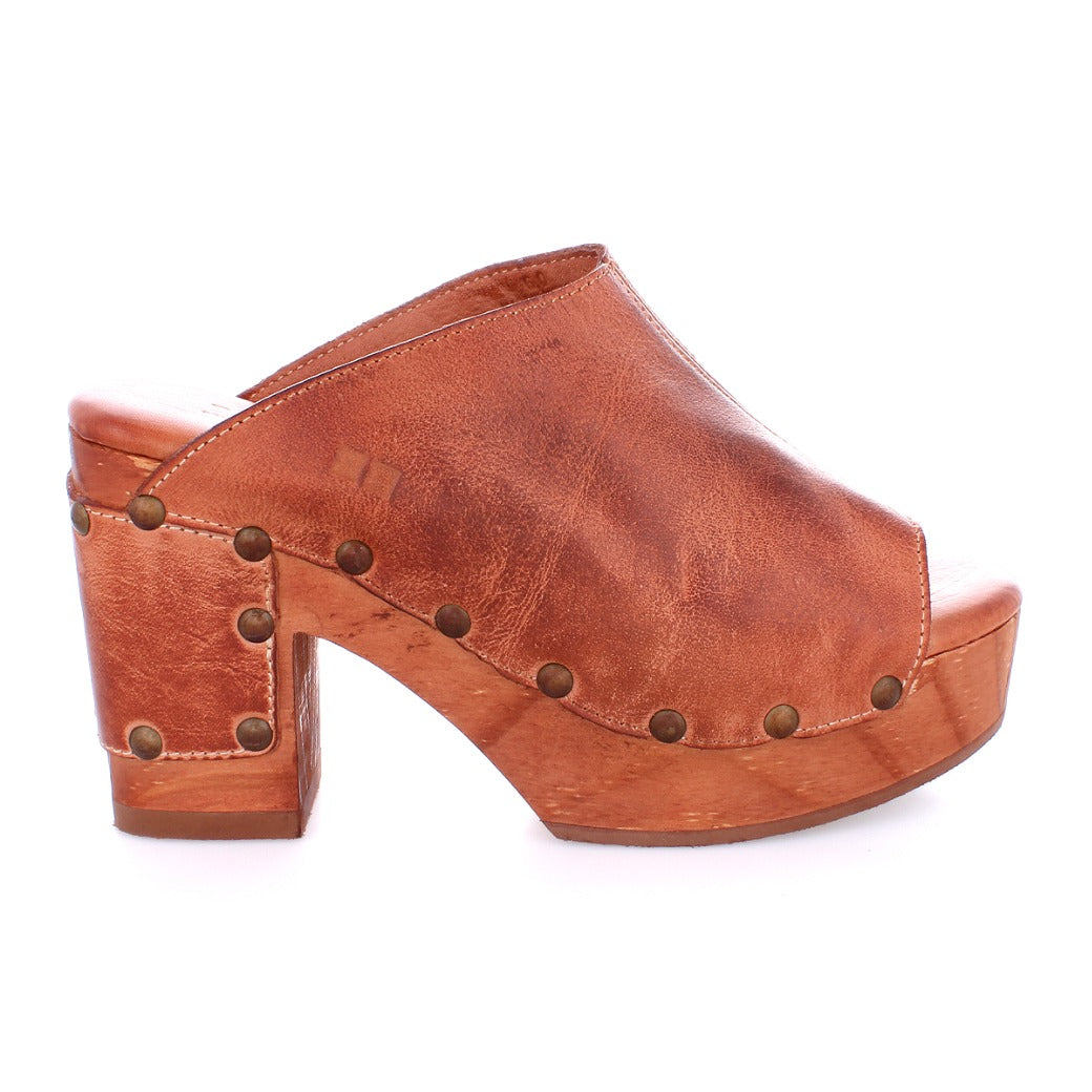 A women's Bed Stu Deva brown leather mule with studded heels.