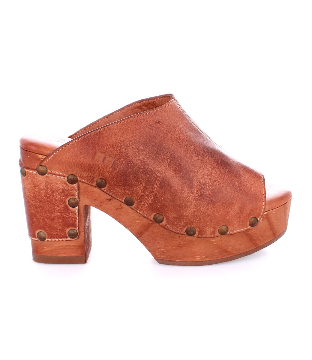A women's Bed Stu Deva brown leather mule with studded heels.