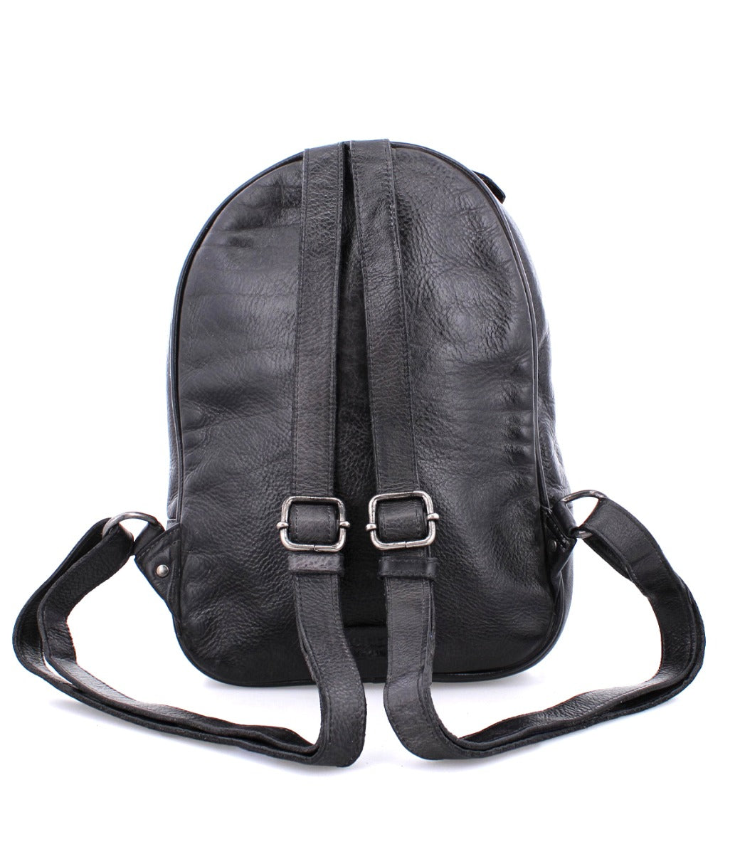 A black leather Dominique backpack with straps and buckles by Bed Stu.