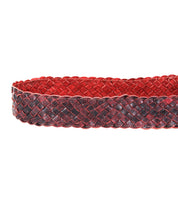 The Dreamweaver by Bed Stu is a red and black woven leather belt featuring a textured pattern and a round brass-tone buckle, exuding vintage allure.