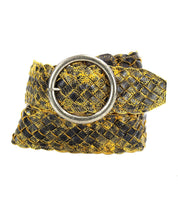 The Dreamweaver belt by Bed Stu, characterized by its black and yellow woven pattern and round brass-tone buckle, exudes vintage allure when coiled in a loop.