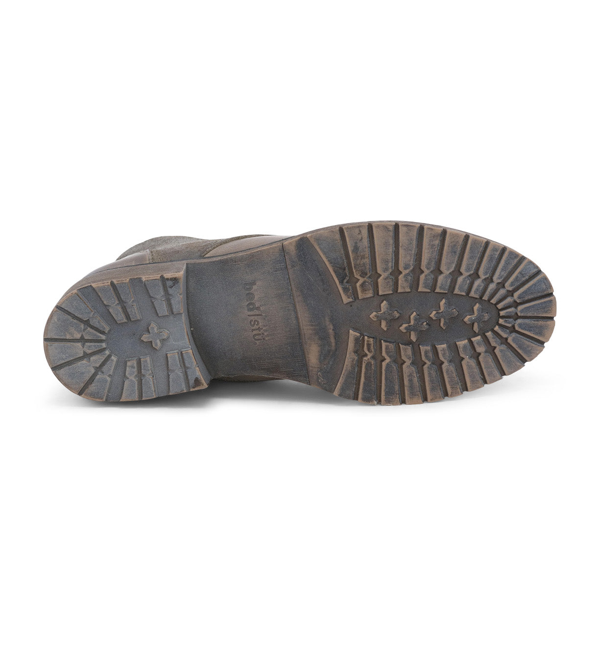 A pair of Bed Stu Dreck shoes with black soles on a white background.