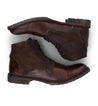 A pair of Bed Stu brown leather boots on a white background.