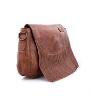 A brown leather Bed Stu Eastend crossbody bag with fringes.