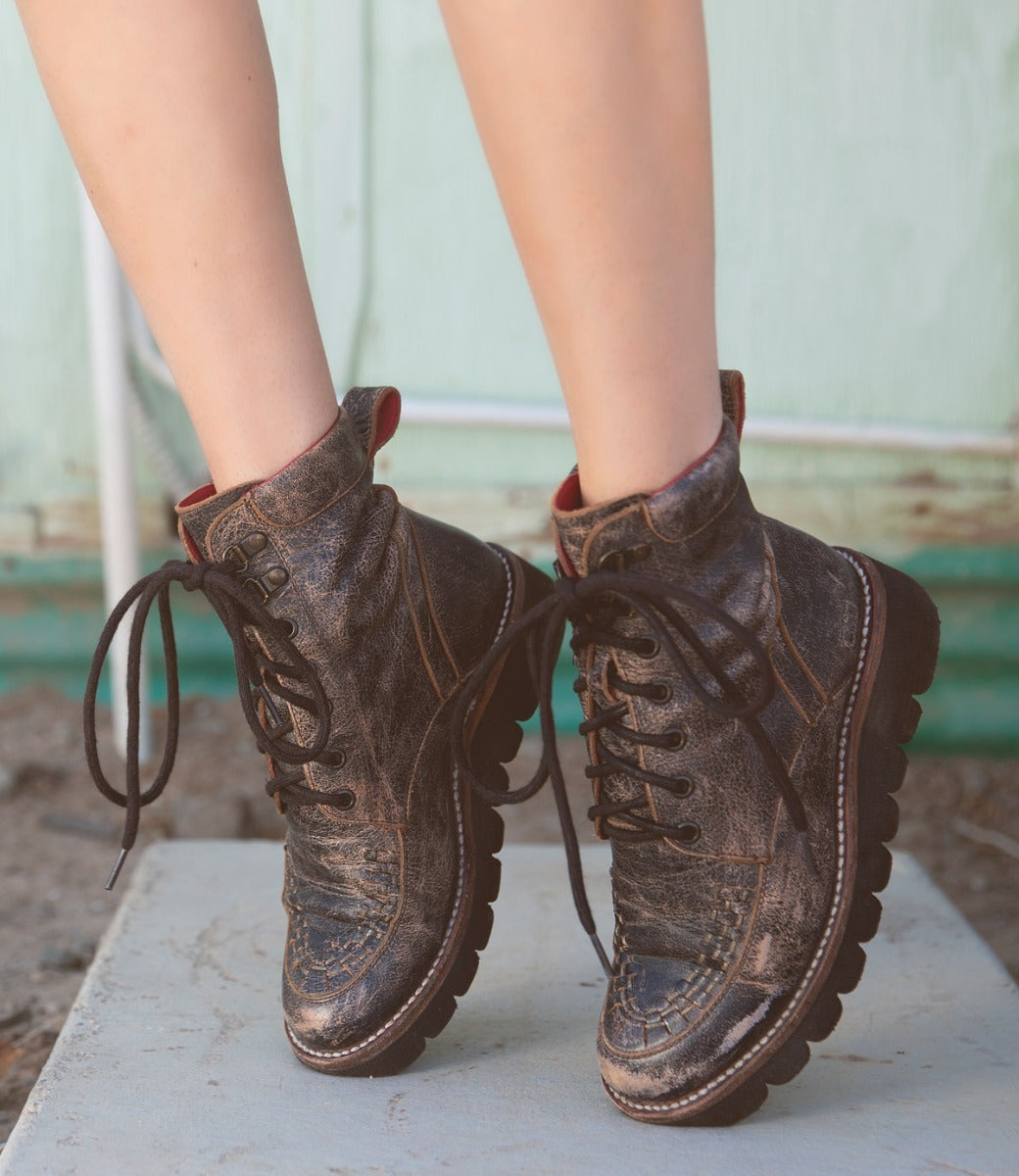 A woman's legs in a pair of Bed Stu Elisha II boots.