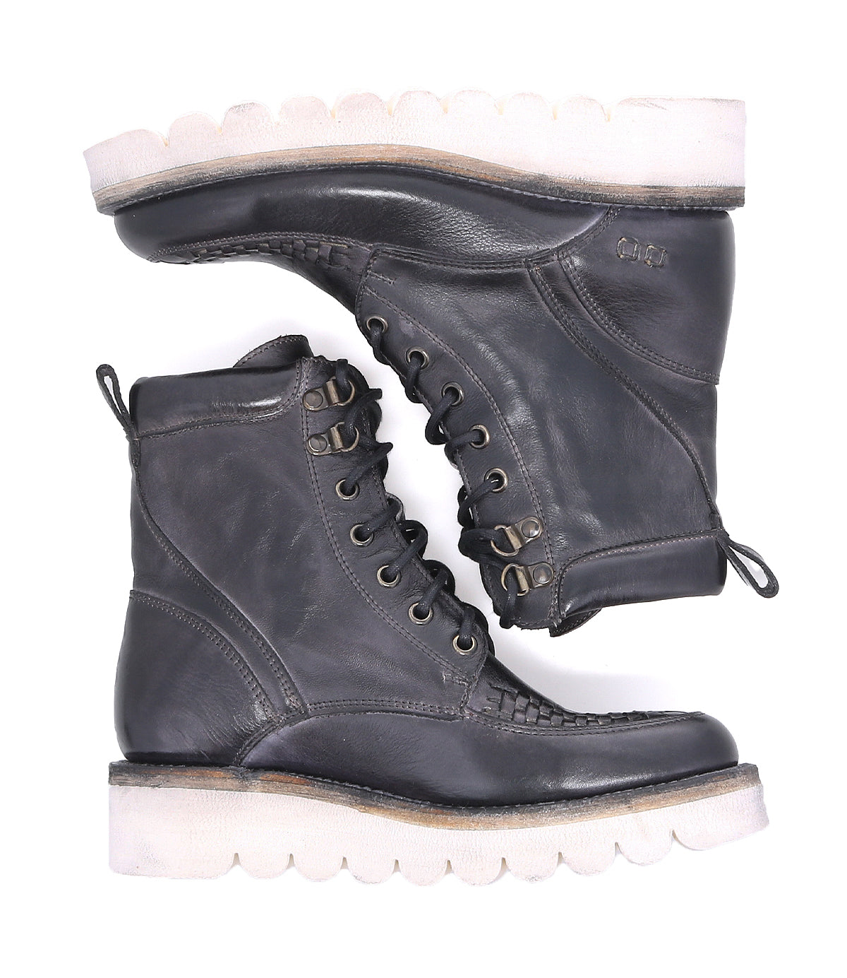 A pair of Bed Stu Elisha II black leather boots on a white background.
