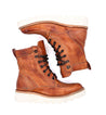 A pair of Bed Stu Elisha II brown leather boots on a white background.