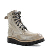 A pair of Bed Stu Elisha II women's boots in beige with black soles.