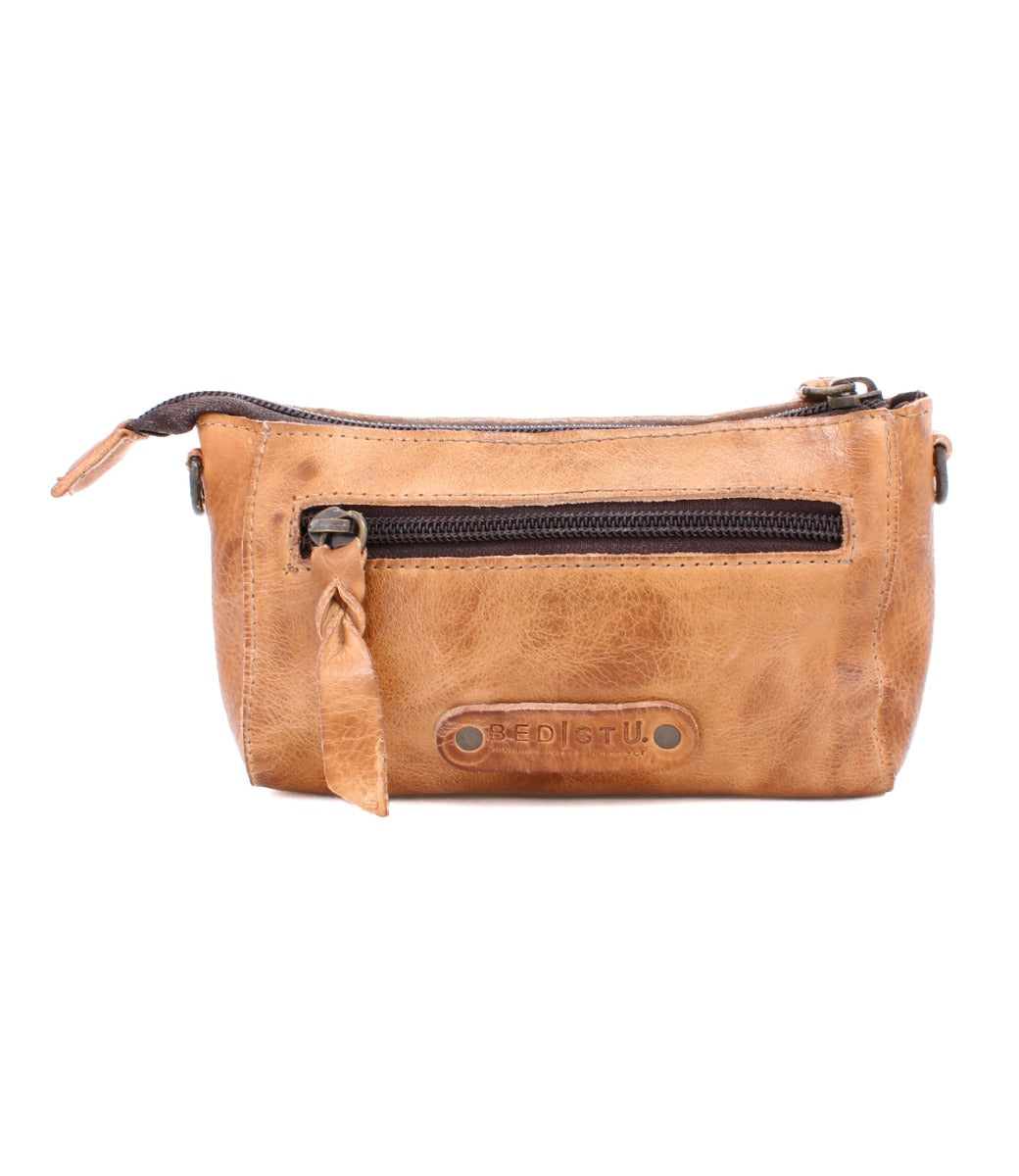 A tan leather pouch with a zipper by Bed Stu.