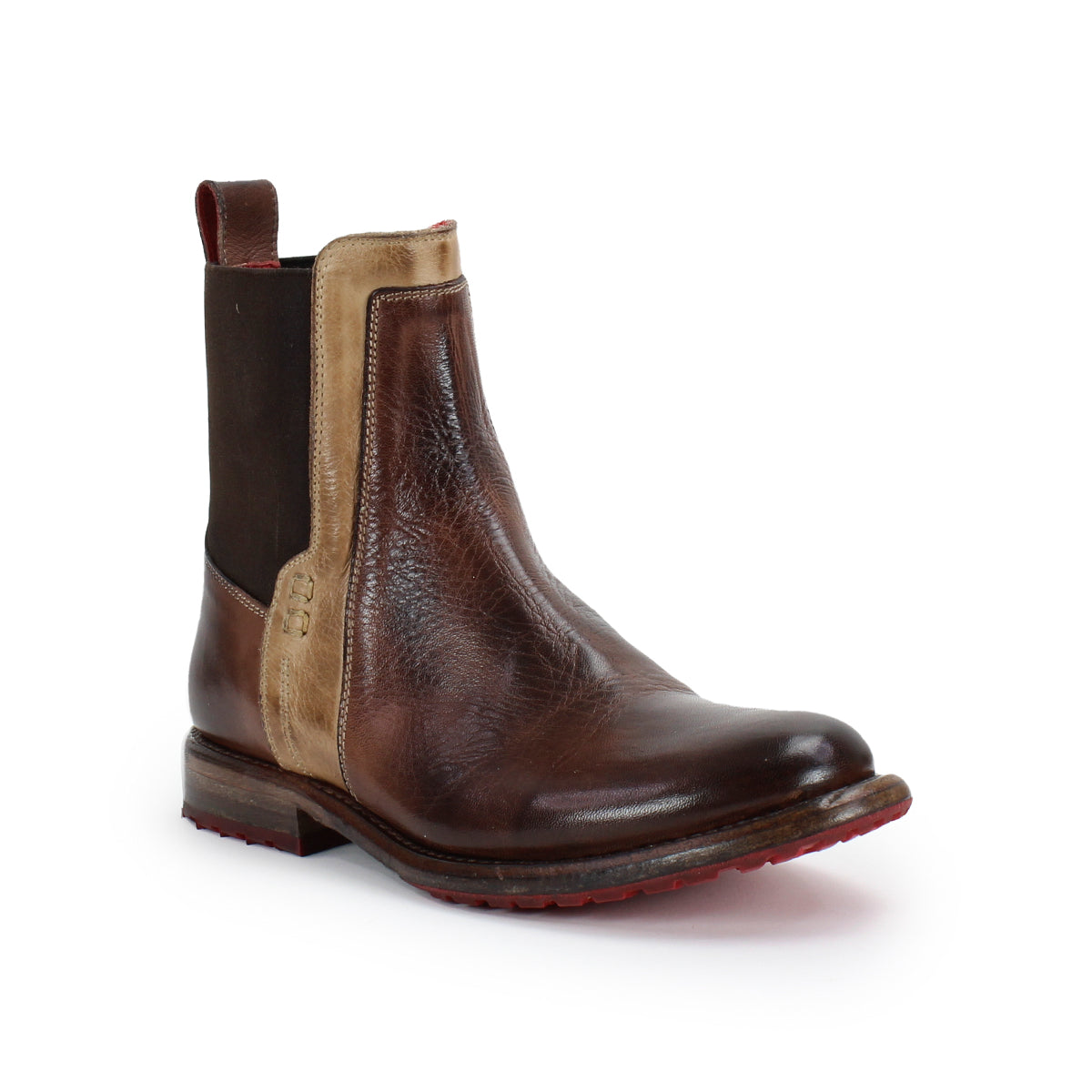 The Bed Stu Ethic brown leather Chelsea boot features vegetable-tanned leather, a tan side panel, dark elastic inserts, a red pull tab, and red sole detailing, shown against a white background.