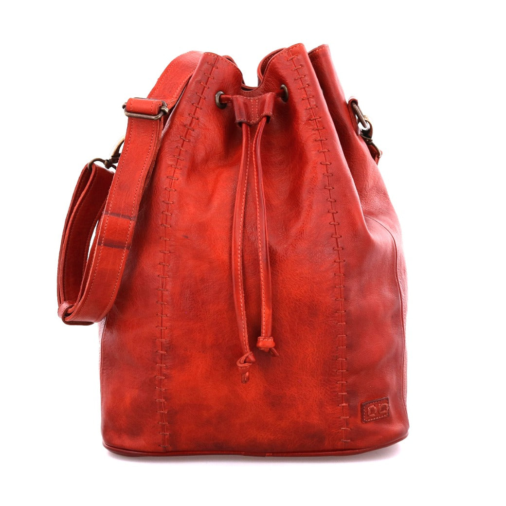 An Eve by Bed Stu red leather bucket bag with a shoulder strap.