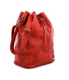 An Eve red leather bucket bag with a strap by Bed Stu.