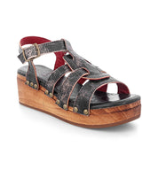 A women's black and wood platform sandal with straps called Fabiola by Bed Stu.