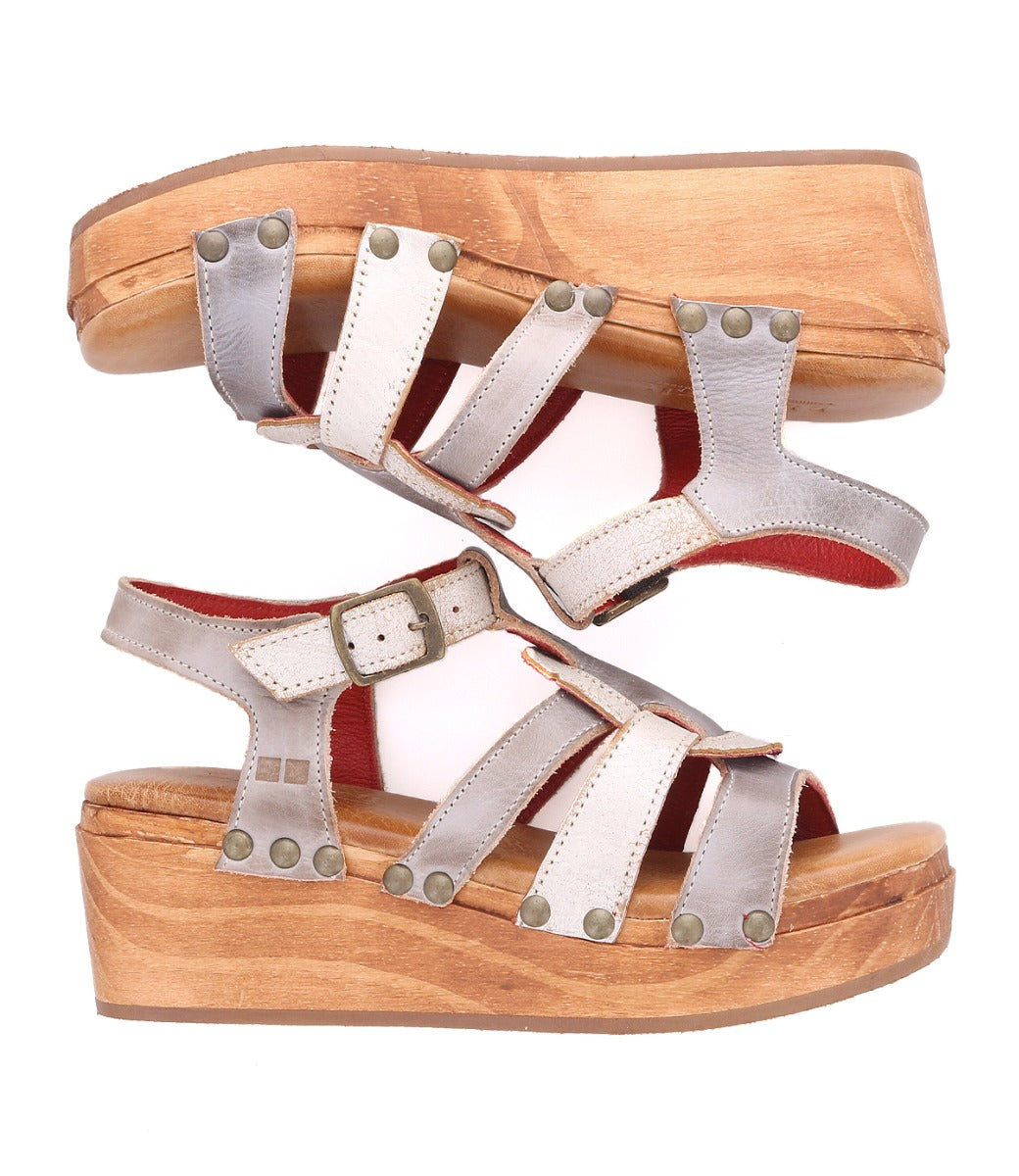 A pair of Fabiola women's sandals with a wooden platform by Bed Stu.
