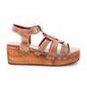 A Fabiola women's sandal with a wooden platform and straps by Bed Stu.