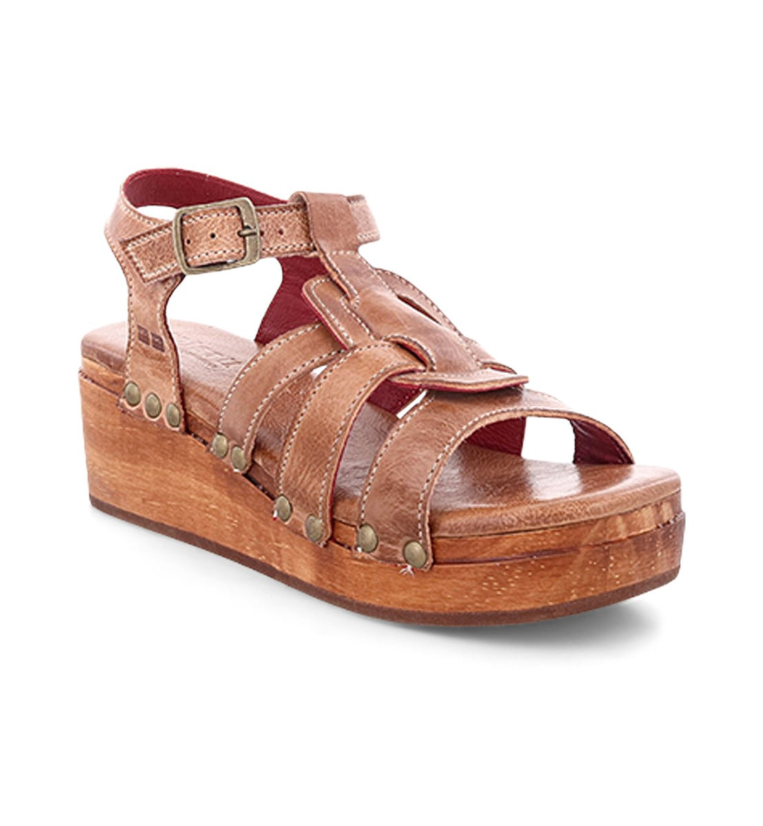 A women's sandal with a wooden platform and straps called Fabiola by Bed Stu.