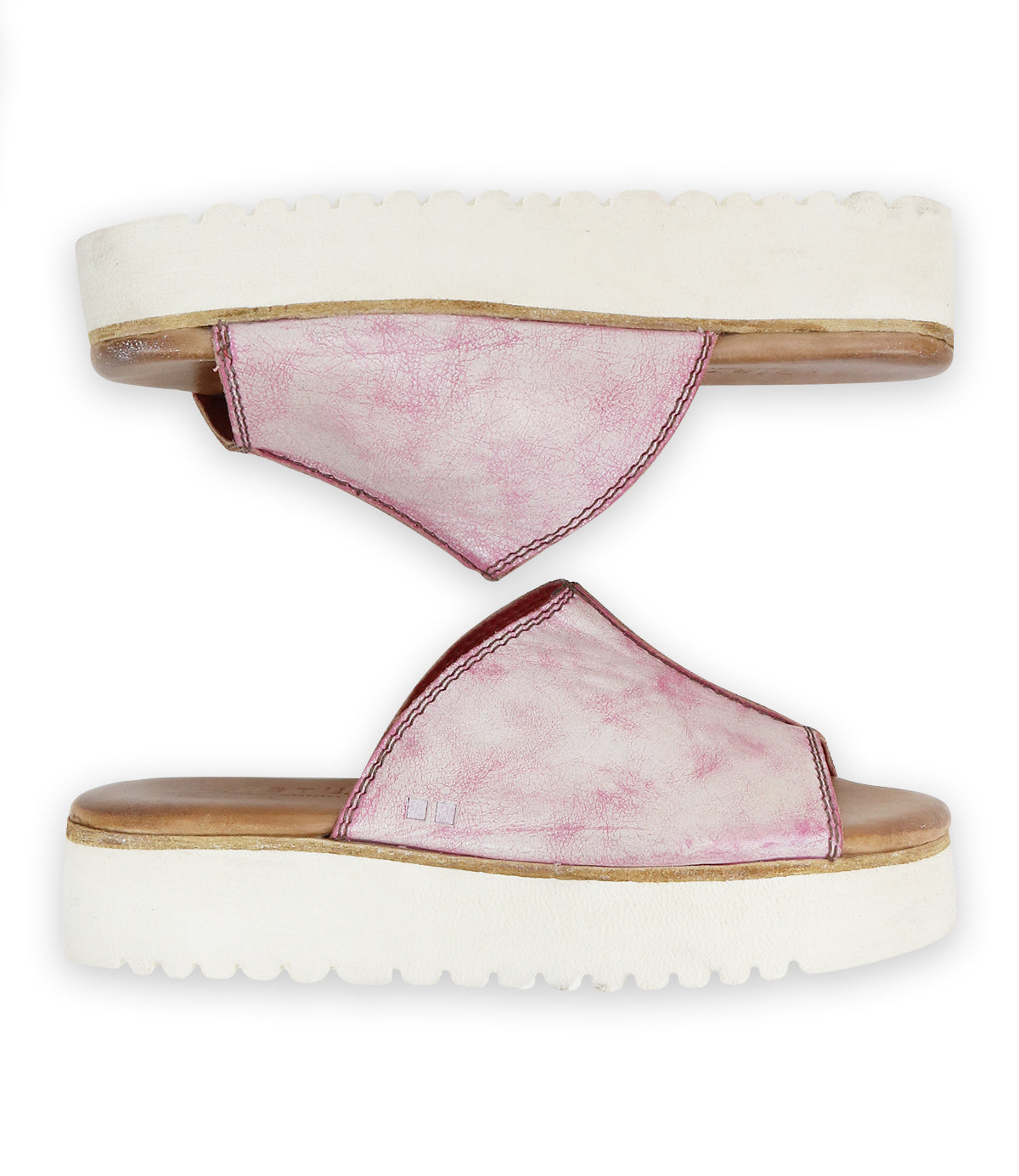Two Fairlee II pink slide sandals from Bed Stu, featuring leather-lined footbeds and white flatform soles, are arranged opposite each other on a pristine white background.