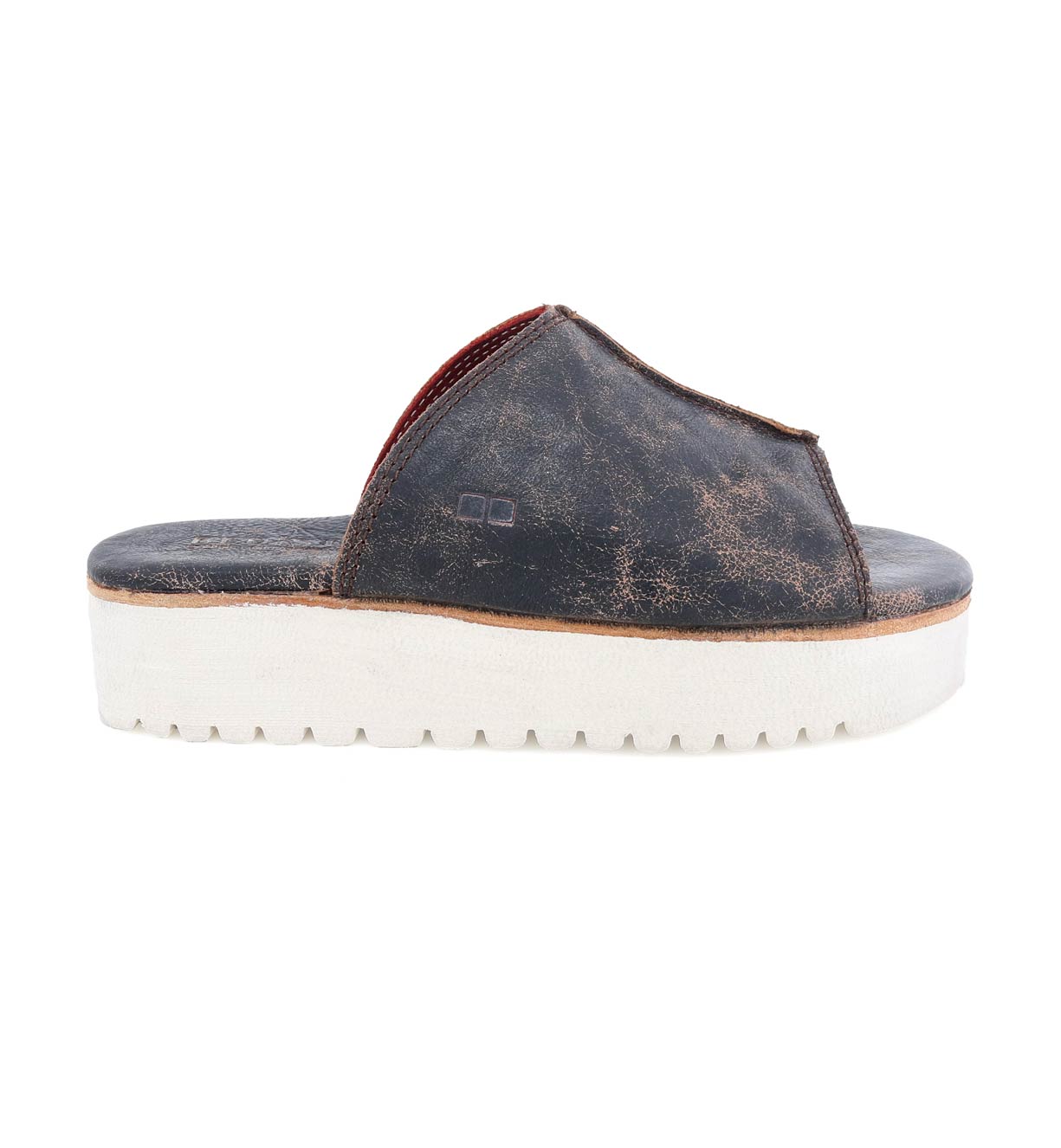 A women's Fairlee II leather slide sandal with a white sole by Bed Stu.
