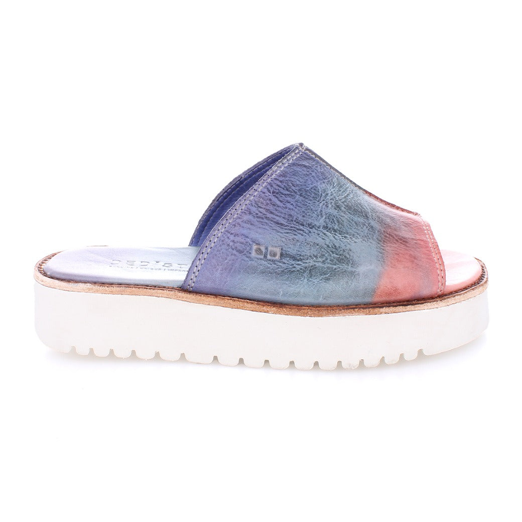 A women's Fairlee II slide on sandal with a multi - colored design by Bed Stu.