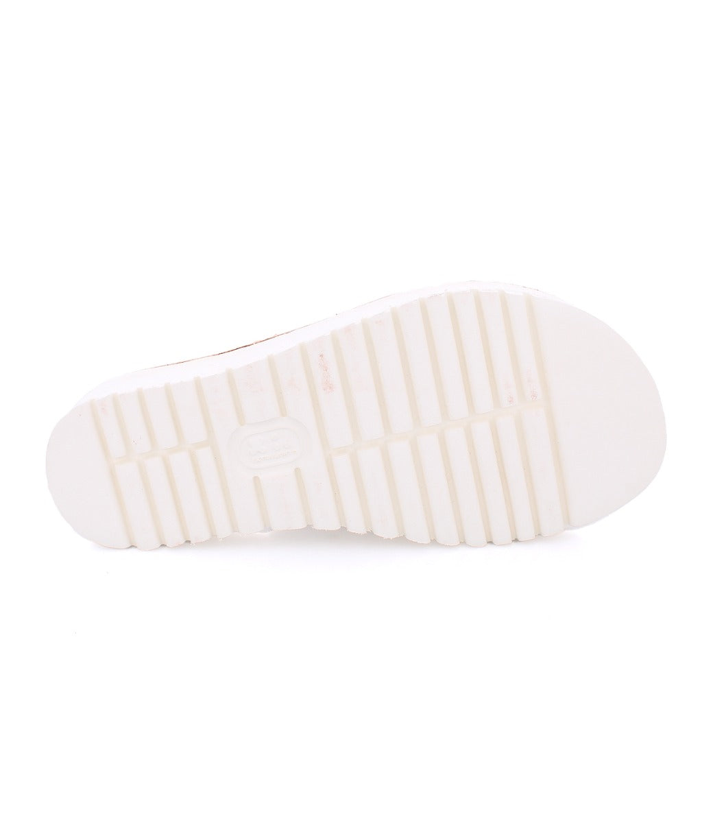 A Fairlee II shoe with white soles on a white background by Bed Stu.