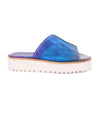 A women's Fairlee II slide on sandal in blue and white by Bed Stu.