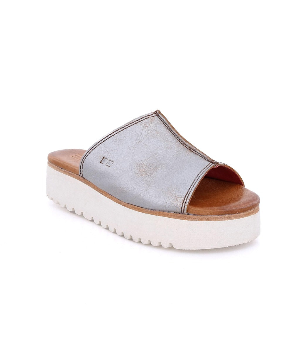 A women's Fairlee II slide sandal by Bed Stu with a white sole.