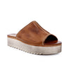 A women's Fairlee II tan leather mule with a wooden platform by Bed Stu.