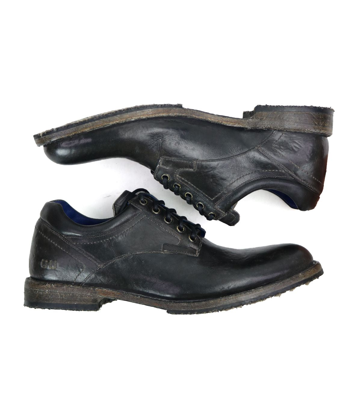 The "Fierce" men's derby shoes by Bed Stu in black leather, featuring laces and displayed from side and top views on a white background, seamlessly combine classic design with a contemporary twist.