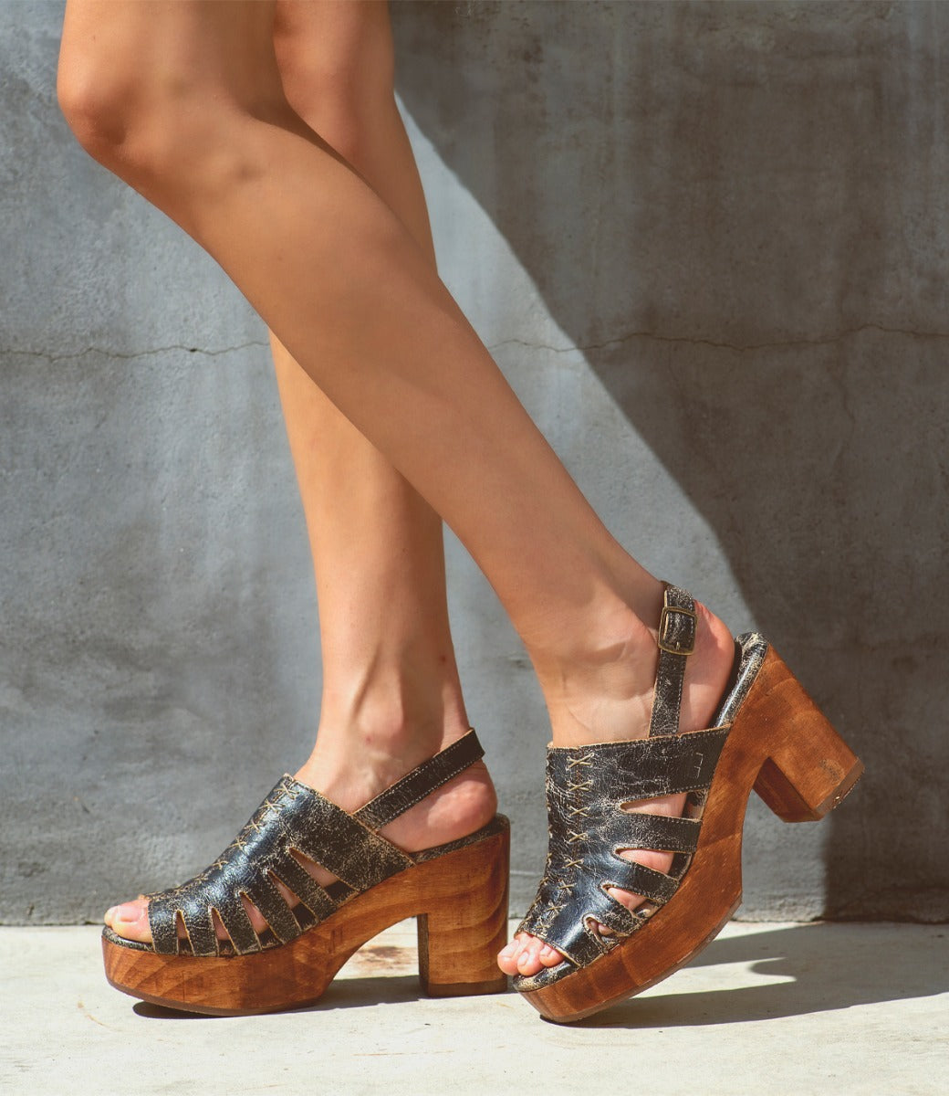 A woman wearing a pair of Bed Stu Fontella high heeled sandals.