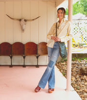 A woman wearing a pair of Fontella by Bed Stu platform sandals.
