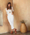 A woman wearing a pair of Fontella platform sandals by Bed Stu.
