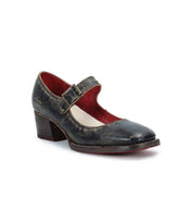 A single black leather Forefront by Bed Stu with an adjustable strap and buckle, featuring a low block heel, distressed finish, and red interior lining.