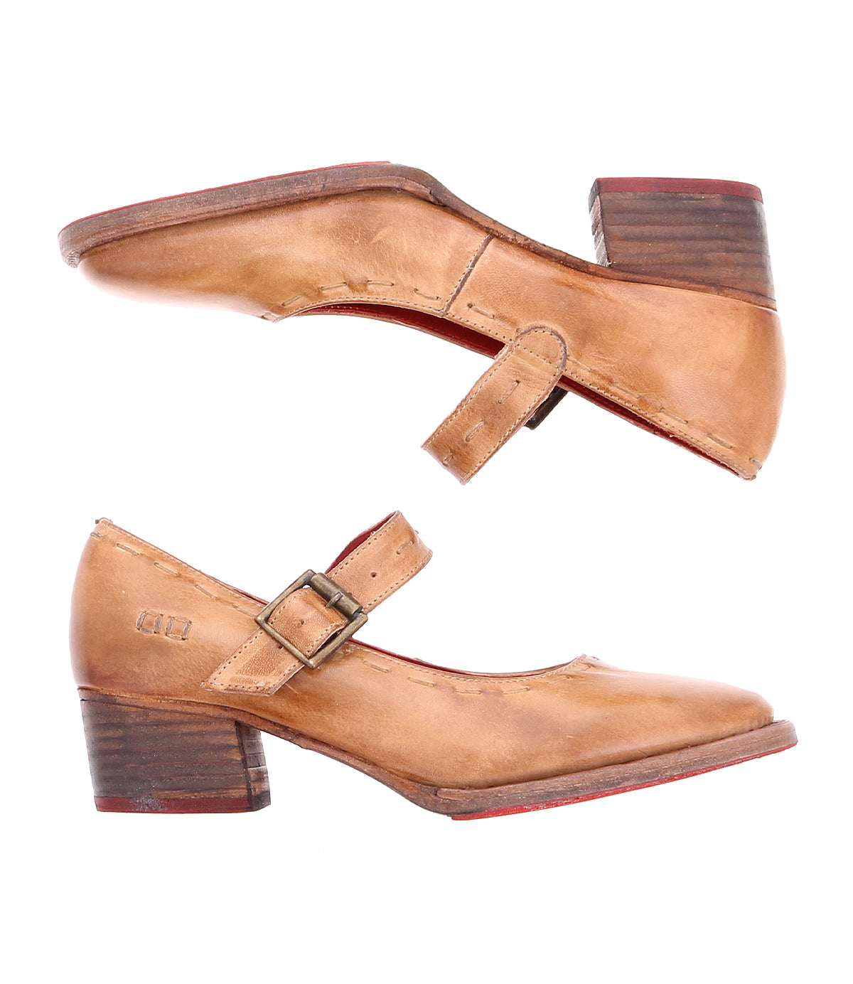 A pair of worn, tan leather Forefront shoes by Bed Stu with a comfortable heel and adjustable straps, shown from the side against a white background.