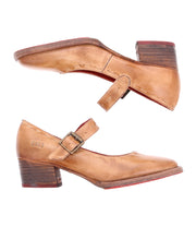 A pair of worn, tan leather Forefront shoes by Bed Stu with a comfortable heel and adjustable straps, shown from the side against a white background.