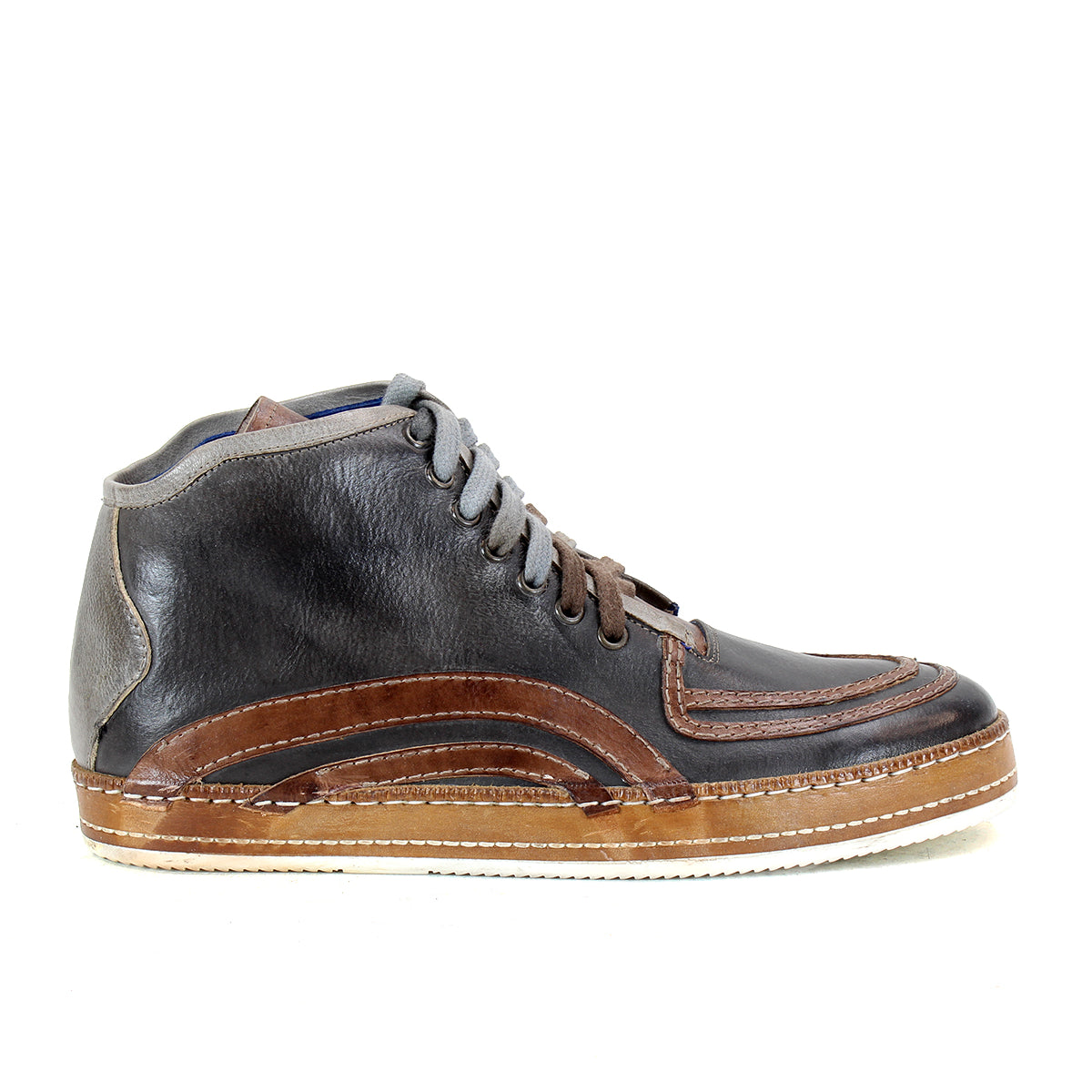 The Bed Stu Formation is a leather high-top sneaker in black, brown, and gray with a vulcanized style. It features a lace-up front and a beige sole.