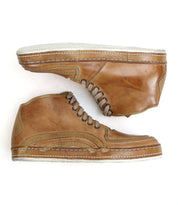 The Bed Stu "Formation" sneakers, in brown leather with a vulcanized high-top design and white soles, are displayed side by side on a pristine white background.