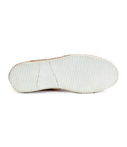 The Formation high-top sneaker by Bed Stu is showcased with its white, ribbed textured sole against a plain background, highlighting its vulcanized style.