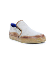 The Freestyle slip-on shoe by Bed Stu showcases a tan and white design with leather detailing, brown trim, a tan rubber sole, and blue interior lining.